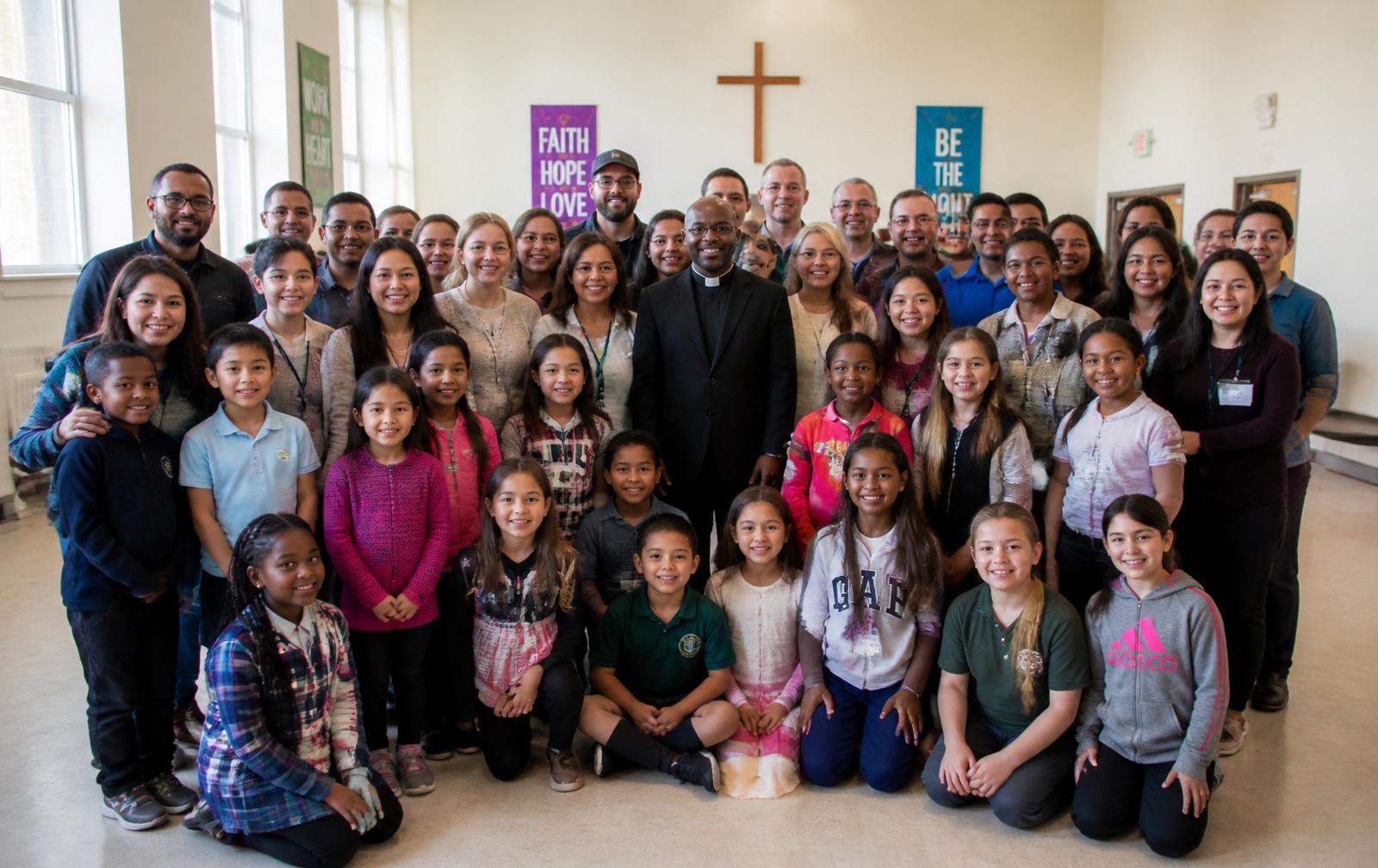 Diverse students, volunteers, and community members gathered outside a school and church campus, smiling and holding books, instruments, and sports equipment at golden hour